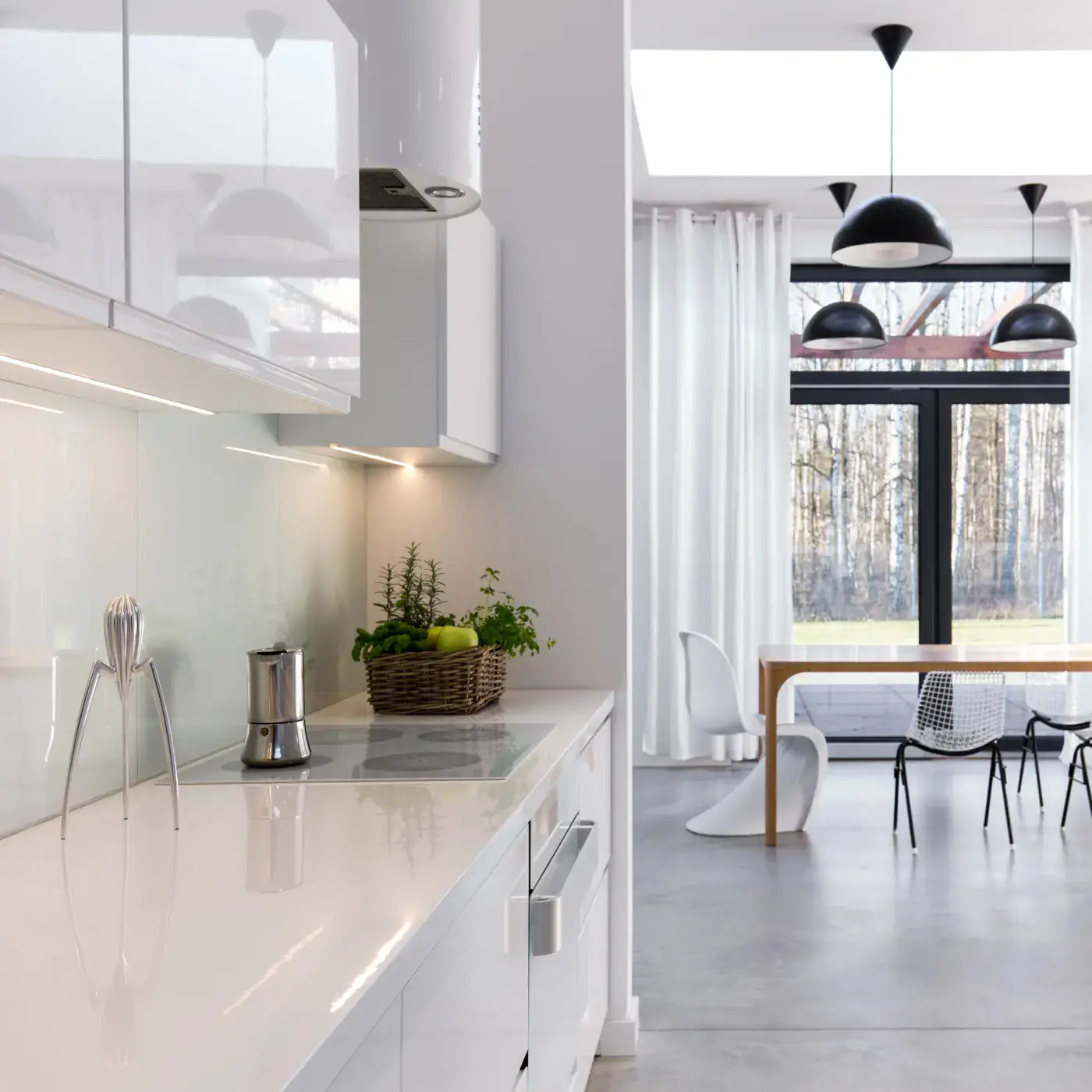 Bright clean kitchen with dining area