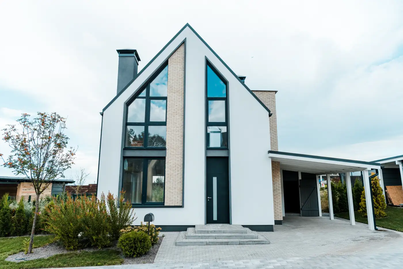 New luxury house near green trees and bushes
